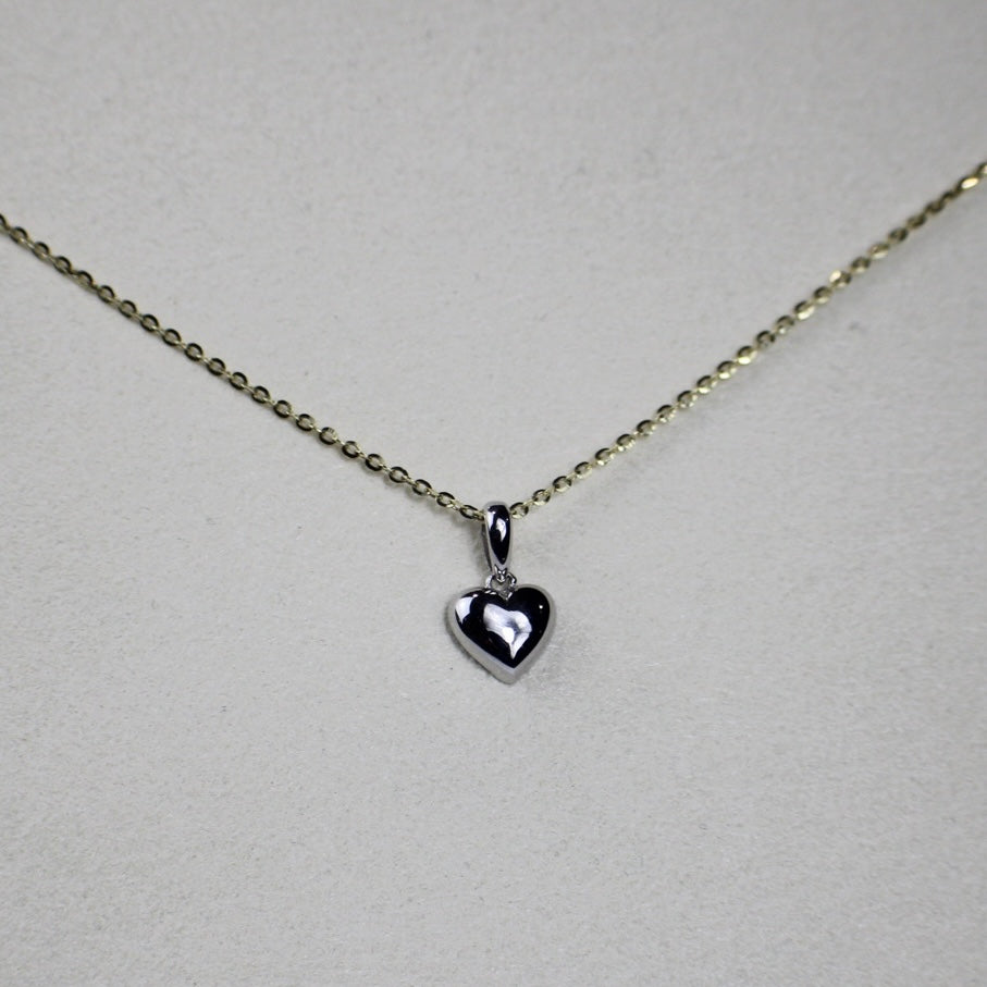 White heart gold necklace