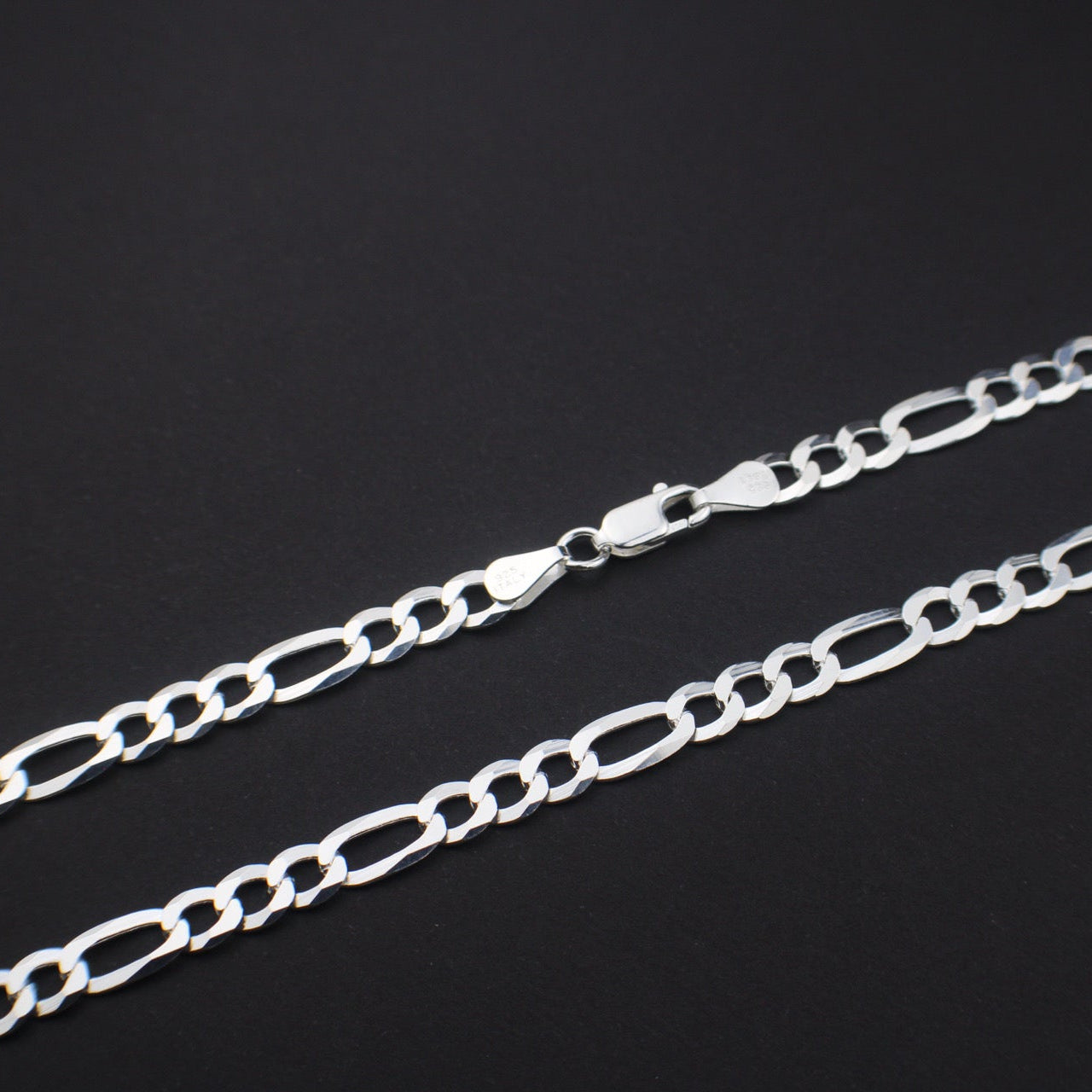 Silver chain on a black background